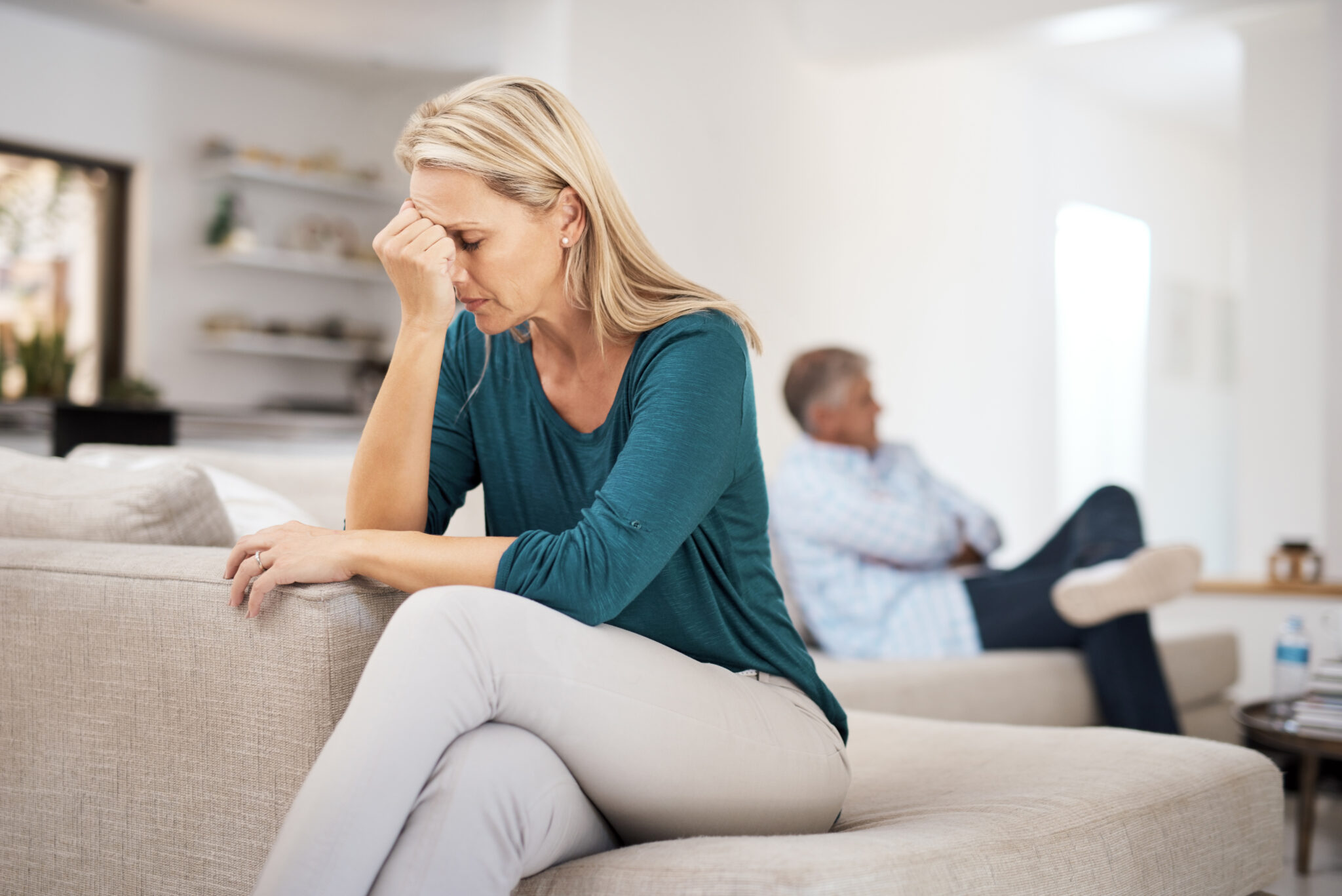 Couch, couple and fight in home for annoyed, divorce or married people for argument. Disagreement, sofa and lounge for frustrated woman, affair or emotion in toxic relationship with mature partner.