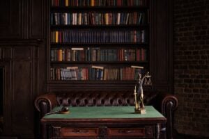 Gavel and Lady Justice figurine on a desk in a law library, representing an Indiana appellate case